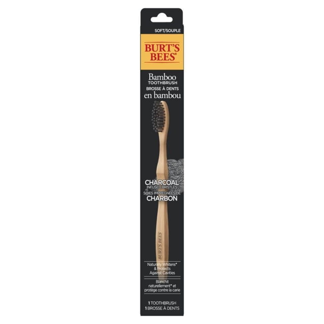 Burt’s Bees Bamboo Toothbrush with Charcoal Infused Bristles in black and yellow packaging, featuring a natural bamboo handle and soft, plant-based charcoal bristles that naturally whiten teeth and protect against cavities, suitable for eco-friendly oral care.