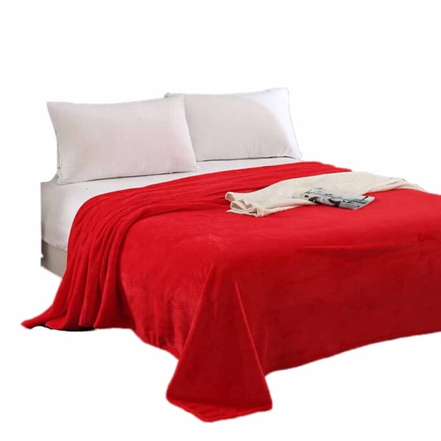 TIMIFIS Blanket Cooling Blanket Super Soft Warm Solid Warm Micro Plush Fleece Blanket Throw Rug Sofa Bedding. A vibrant red flannel blanket draped over a white bed with two white pillows, showcasing its soft and cozy texture. The blanket measures 70x100cm and is made of 100% micro plush microfiber, offering warmth and comfort. Suitable for use on sofas, beds, or as a decorative throw in living rooms or bedrooms. Machine washable and easy to maintain.