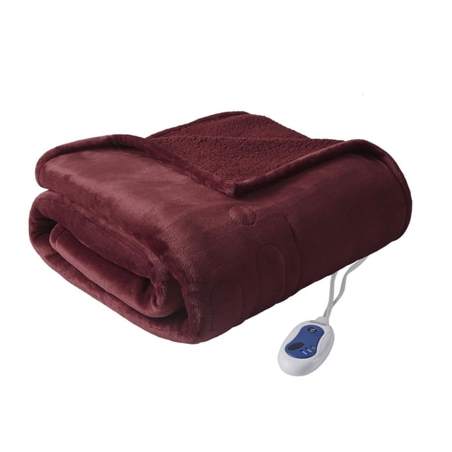 Home Essence Apartment Heated microlight to teddy fleece throw in burgundy, folded to show plush microlight fabric and reversible teddy fleece, with attached white and blue controller featuring 3 heat settings and 2-hour auto shut off, oversized 60 by 70 inches electric throw suitable for added warmth in bedding.