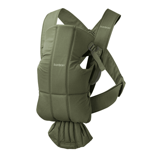 BabyBjorn Baby Carrier Mini in woven green fabric, designed for newborns with a compact, soft structure and ergonomic support. Features adjustable straps for comfort and closeness, ideal for baby gear and front carrier use.