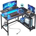 thumbnail image 1 of Bestier 42'' Small L Shaped Gaming Desk with Power Outlets Carbon Fiber Black, 1 of 9