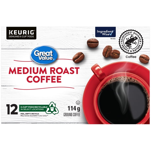 Great Value Medium Roast Coffee 12-pack of genuine K-Cup pods compatible with Keurig coffee makers, containing 114 grams of ground coffee. The packaging shows a red cup of steaming brewed coffee on a white wooden background with scattered coffee beans, featuring Rainforest Alliance and Ingredient Wise certifications.