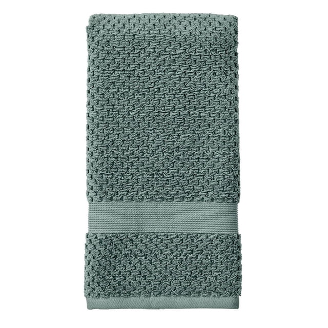 Better Homes & Gardens Signature Soft Popcorn Texture Towel Collection folded muted green towel featuring a popcorn weave and smooth band, made of 90% US cotton and 10% viscose, extra absorbent, fade resistant, low lint, ideal for kids' bathroom and suitable as a soft bath wrap.