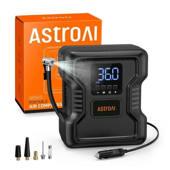 AstroAI Tire Inflator, Portable Air Compressor for Tires, Car Tire Air Pump 150 PSI, 12V DC. The compact black device features a digital LCD display showing 36 PSI, a power cord, and multiple nozzle attachments. The orange packaging with AstroAI branding is visible in the background. Designed for inflating car tires, bicycles, balls, and other inflatables, it includes an LED light for use in low-light conditions and an automatic shut-off feature for safety.