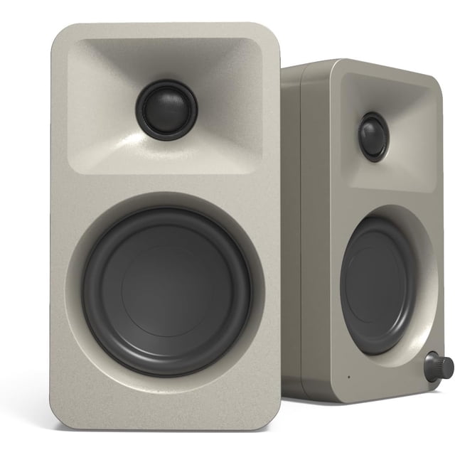 Kanto ORAME 100W Powered Reference Desktop Computer Speakers in a moon-coloured finish, featuring Bluetooth 5.0 and USB-C input. These bi-amplified speakers include 3-inch woofers and ¾-inch silk dome tweeters, delivering reference-quality sound. Designed with a 100 Hz automatic crossover for seamless subwoofer integration, they are ideal for creators, gamers, and musicians. Compact and suitable for desktops, they support USB-C, Bluetooth, and RCA inputs for versatile connectivity.