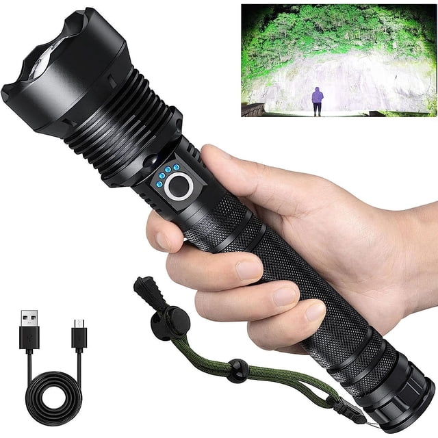 SURJDE Rechargeable Flashlights 900,000 Lumens, a high-lumen LED flashlight with a black aluminum body, shown held in hand. Features include a power display, USB charging port, and a green lanyard for secure grip. Offers 5 lighting modes (High, Medium, Low, SOS, Strobe) and an adjustable head for wide or focused beams. Includes a USB charging cable and is suitable for camping, hiking, and emergencies. An inset image highlights its powerful beam illuminating a large outdoor area.