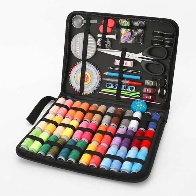 Sewing Kit, 183PCS Premium Sewing Supplies Accessories displayed in an open black zippered case. The kit includes 36 solid color threads, 2 rainbow threads, 40 pearlescent needles, 30 goldtail pins, 10 needles, 10 pens, 10 marking buckles, 10 black buttons, 10 white buttons, 4 dress shuttles, scissors, a thimble, a seam ripper, a magnifying glass, a needle ball, and other sewing tools. The compact case measures 4.5 x 20.5 x 27.5 cm and weighs 520 g, making it ideal for crafting and repairs.