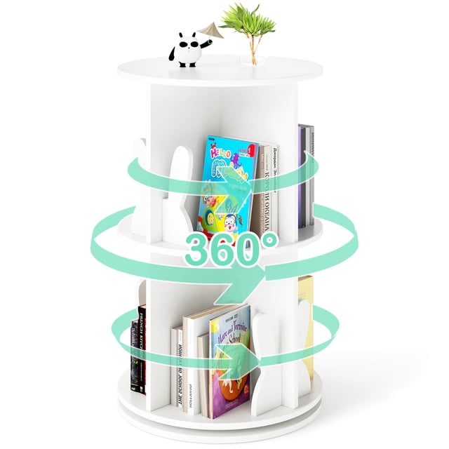 Costway Kids Rotating Bookshelf 2 Tier Freestanding 360° Revolving Display Storage Rack in white. This compact, round bookshelf features a 360° rotating design with 8 compartments, each with bunny-shaped baffles for added charm and organization. The top surface is ideal for decorations or frequently used items. Made from sturdy MDF, it includes anti-slip foot pads for stability and floor protection. Suitable for kids' rooms, playrooms, or living spaces.