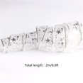 thumbnail image 2 of Christmas Tree Decorations Silver Ribbon String Lights 6.5ft 20 Led Fairy Lights Battery-Powered Copper Wire Ribbon Bows Lights for Christmas New Year Decor, 2 of 3