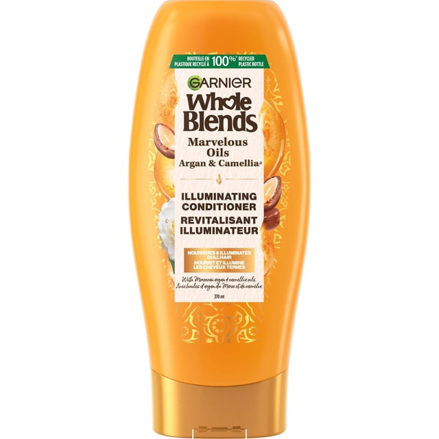 Garnier Whole Blends Marvelous Conditioner in a 370 ml orange bottle featuring Moroccan argan and camellia oils, an illuminating conditioner that nourishes and revitalizes dull hair, made with 100% recycled plastic, also suitable as a leave-in treatment for frizz control and color protection.