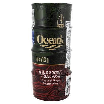 Ocean’s Wild Sockeye Salmon 4 × 213g, a stack of four cans with bold branding in red and black, emphasizing omega-3 polyunsaturates and sustainable fishing. Perfect for pantry storage, canned seafood recipes, and Canadian salmon dishes.