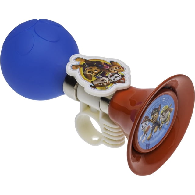 Paw Patrol™ Klaxon de Vélo 3D avec Ampoule en Caoutchouc Bleue et Klaxon en Plastique Brun Mettant en Vedette un Insigne Circulaire de Personnages Pat' Patrouille. Il a une Pince Blanche pour une Fixation Facile aux Vélos, Tricycles Ou Trottinettes, Ajoutant du style et de la Sécurité aux Jeunes Cyclistes.