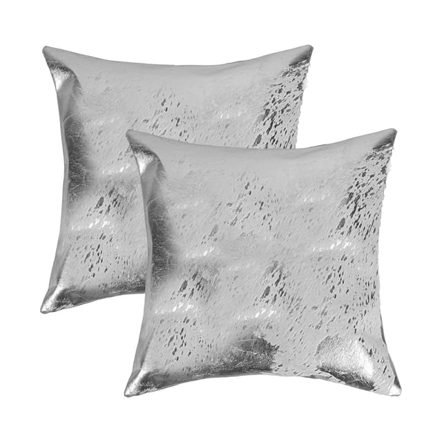 TORINO SCOTLAND COWHIDE PILLOW 18"X18" 2-PACK showing two square decorative pillows made from 100% natural Indian cowhide with a silver and white speckled pattern, hand-stitched with hidden zipper closures and polyfil inserts, suitable for layering on sofas or beds to add texture and warmth.