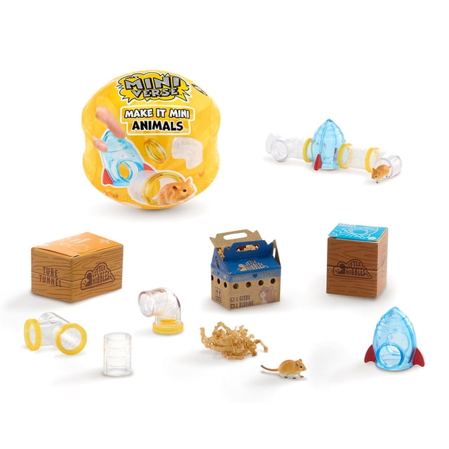MGA's Miniverse Make It Mini Animals Series 2 Mini Collectibles with a yellow surprise ball, a small mouse figure, clear plastic tube tunnels with yellow connectors, a blue rocket-shaped habitat, cardboard boxes labeled Tube Tunnel and Squeaky Squeaks, and shredded paper bedding for assembling miniature animal habitats.