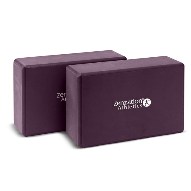 Twin Block Set with two dense, odorless EVA foam yoga blocks in deep purple, each 3 x 6 x 9 inches, featuring beveled edges for easy grip and the white Zenzation Athletics logo, designed to support and stabilize yoga poses for better alignment and flexibility, also suitable for Pilates practice.