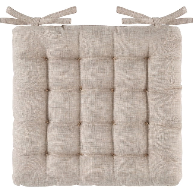 Hometrends Chair Pad in beige linen-look polyester, 17x17 inches, tufted with square stitching and tie straps, designed to add comfort and style to dining chairs and table linens in home settings.