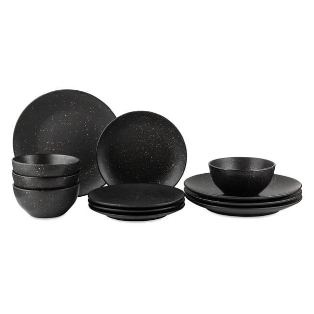 Thyme & Table Merrick 12-Piece Dinnerware Set with matte black finish and gold speckle accents, includes four dinner plates, four salad plates, and four bowls arranged in stacks, microwave and dishwasher safe, suitable for modern dining and casual or special occasions.