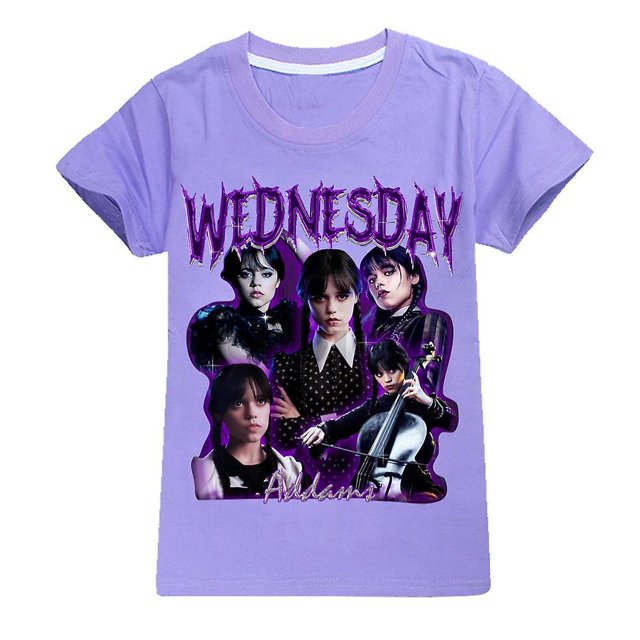 Wednesday Addams Print Kids Girls T-shirts in a light purple shade featuring a bold graphic design with the word 'Wednesday' and themed imagery. This short-sleeve, crew neck tee is crafted from a cotton blend, ensuring lightweight, skin-friendly comfort. The shirt uses 3D dye-sublimation technology for vibrant, fade-resistant colors. Perfect for casual summer wear, travel, or themed events like Halloween, birthday parties, or Christmas.