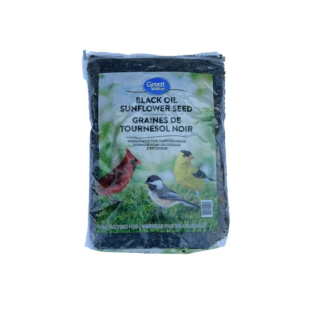 Great Value Black Oil Sunflower Seed 4 Kg bag of black oil sunflower seeds for wild bird food, featuring a clear plastic package with a label showing a red cardinal, black-capped chickadee, and yellow goldfinch on grass, formulated to attract a variety of outdoor birds to feeders.