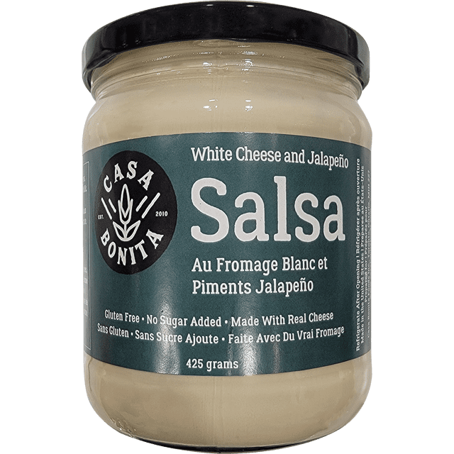 WHT CHEESE SALSA in a clear glass jar with black lid and teal label reading white cheese and jalapeño salsa, gluten free, no sugar added, made with real cheese, 425 grams, by Casa Bonita, ideal as a gluten-free salsa dip with jalapeño flavor.