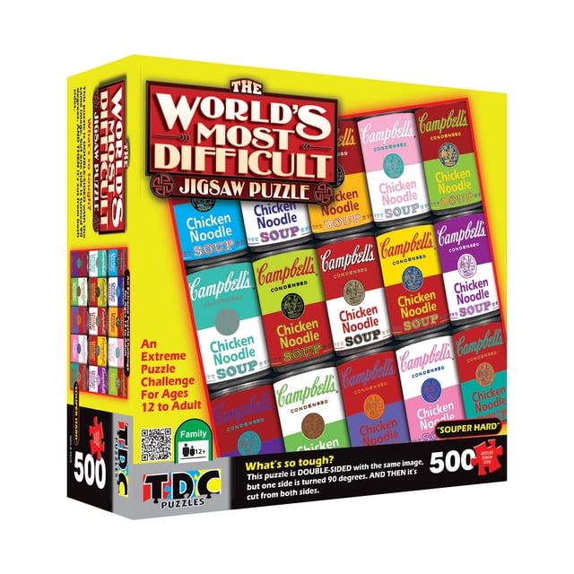 TDC Games World's Most Difficult Jigsaw Puzzle Campbells Souper Hard 500 pc. This multicolour puzzle showcases a Campbell's Soup theme with colourful can designs. It is double-sided with the same artwork on both sides, one rotated 90 degrees, and all pieces are identical in shape for an extra challenge. The puzzle measures 15 x 15 inches when completed and is suitable for ages 12 and up. The packaging emphasizes its difficulty and suitability for family entertainment.