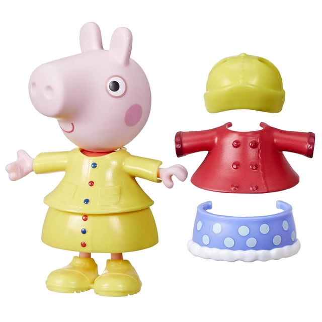 Peppa Pig Dress-Up Figure showing a 6-inch pink pig doll wearing a yellow raincoat, skirt, and boots, with three detachable accessories: a yellow rain hat, red coat, and blue polka-dot skirt, designed for imaginative dress-up play for rainy and snowy weather.