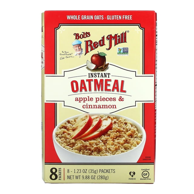 Bob's Red Mill Instant Oatmeal Packets, Apple Pieces & Cinnamon, 8 packets, 1.23 oz each. The packaging features a red and beige design with an image of oatmeal topped with apple slices. Certified gluten-free, non-GMO, and kosher pareve, made with whole grain oats and flaxseed. Ideal for a quick breakfast or on-the-go meal.