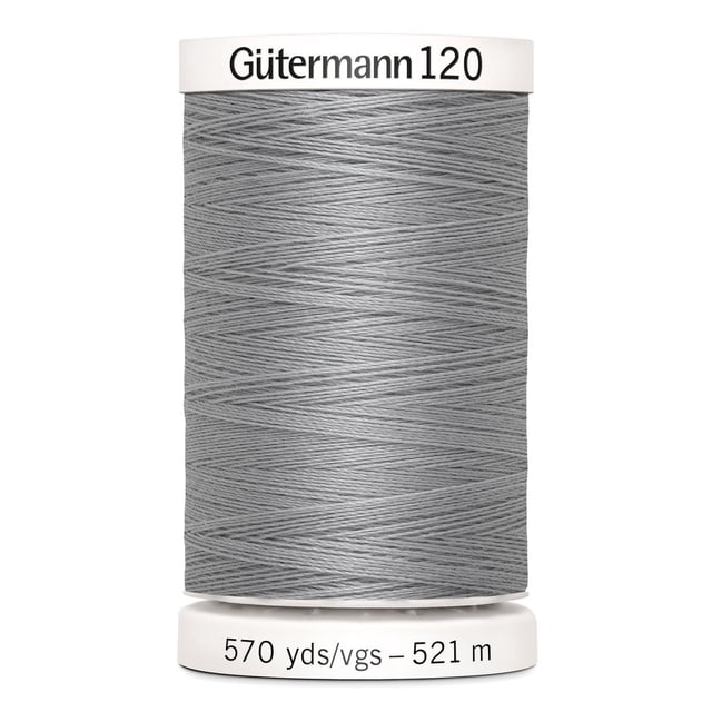 Gutermann 120 100% polyester all purpose thread spool in grey with white plastic ends labeled with brand and length 570 yards (521 meters), suitable for machine and hand sewing on cotton, synthetics, wool, and craft projects like home décor and beading.
