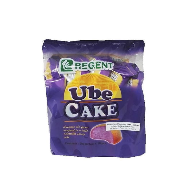 Regent Ube Cake 20g x 10 pcs pack of individually wrapped purple yam flavored sponge cakes in a purple bag with yellow and white text, featuring a sliced cake image showing its moist, fluffy texture and vibrant purple color, suitable for snacks or lunchboxes.