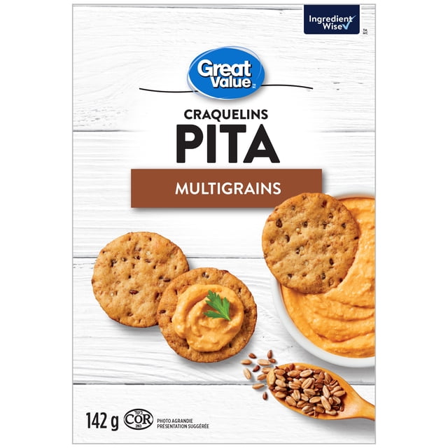 Great Value Multigrain Pita Crackers box showing round multigrain crackers with flax seed, oat bran, millet seeds, and rolled oats, one topped with hummus and parsley, a bowl of hummus, and a wooden spoon with mixed grains on a white wooden surface.