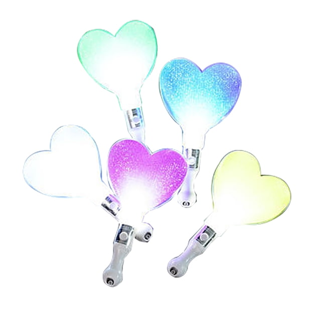 Light Stick Creative Fashion Plastic LED Light up Sticks Glow Sticks for Kids. The image shows five heart-shaped LED light sticks in various colors, including green, blue, purple, yellow, and white. Each stick features a plastic handle and emits a soft glow. Designed for parties, concerts, birthdays, and other festive occasions, these light sticks are portable and scalable. Made of durable plastic with a built-in battery, the package includes one light stick in a random color.