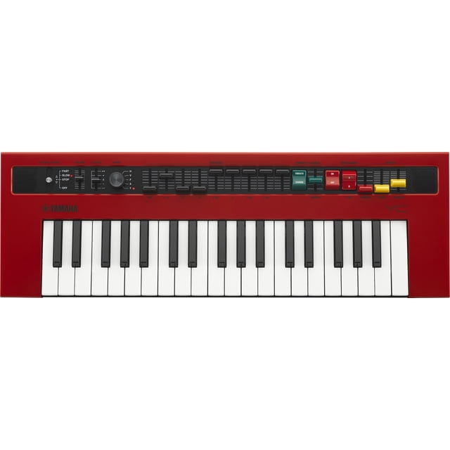 Yamaha Reface YC Mini Clavier Mobile à 37 Touches au design compact avec 37 Touches, un Châssis Rouge et des Touches Noires et Blanches. le Panneau de Commande Comprend des Curseurs pour le Réglage des Séquences, le Contrôle des Haut-Parleurs Rotatifs et des Boutons pour le vibrato, les Chœurs, la Distorsion et les Effets de Réverbération. Il Offre Cinq Vagues d'Orgue vintage, des Haut-Parleurs Stéréo Intégrés, une Connectivité MIDI, des Sorties à Double Ligne et une Entrée Auxiliaire. Convient aux Music