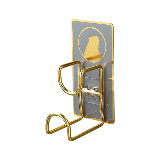 CEHVOM Invincible Hook-free Towel Rack Traceless Hook Free Punch Kitchen Bathroom Door. A compact, gold-colored iron towel rack with a dual hook design, mounted on a transparent adhesive backing featuring a bear logo. Designed for smooth, non-porous surfaces like ceramic tiles, glass, and mirrors, it offers a traceless, damage-free installation without screws or glue. Dimensions: 11.5 x 6.2 x 6 cm.