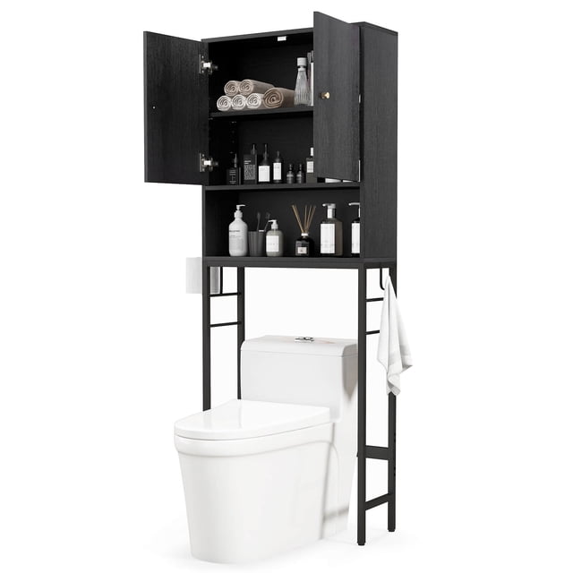 Costway Over The Toilet Storage Cabinet Free Standing Toilet Rack with Adjustable Shelf in black. A bathroom organizer featuring a two-tier storage cabinet with doors, an open compartment, and side hooks for toiletries, towels, and cosmetics. Built with durable metal tubing and reinforced crossbars, offering a 44-pound weight capacity per tier. Includes an anti-tipping device, adjustable footrest, and bottom bar for stability and customization. Measures 9 inches wide, 25 inches deep, and 62.5 inches tall, designed to fit most standard toilets. Space-saving and rust-resistant, ideal for maximizing bathroom storage.