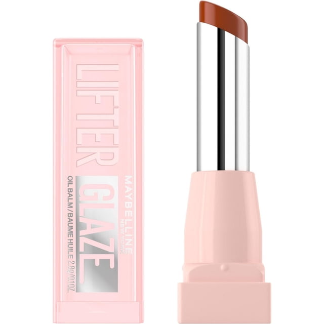 Maybelline New York Lifter Glaze Oil Balm in a light pink rectangular tube with a clear cap, showing a brown tinted balm stick with a shiny silver base, formulated with hyaluronic acid to hydrate lips and add a sheer, glossy tint.