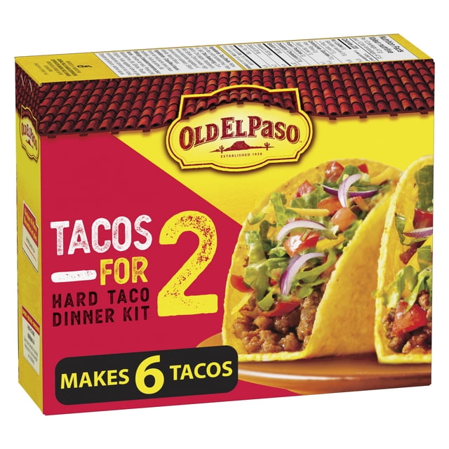 Old El Paso Tacos for 2 Hard Taco Dinner Kit box showing 6 hard taco shells filled with seasoned meat, lettuce, tomato, and red onion on a yellow and red background with the Old El Paso logo, highlighting it makes 6 tacos for a quick Mexican meal.