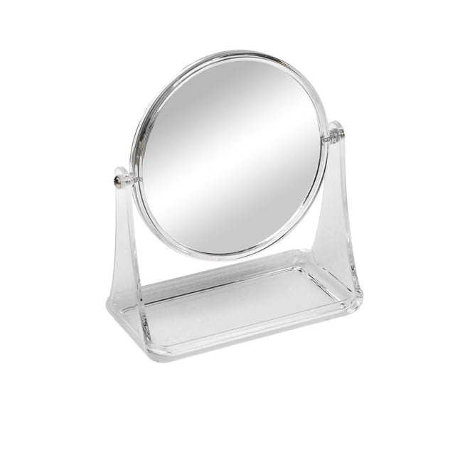 Mainstays Clear Double-Sided Vanity Mirror with clear plastic frame and built-in tray, featuring a round mirror that rotates 360° for 1x and 3x magnification, ideal for organizing makeup, jewelry, and small accessories on a vanity.