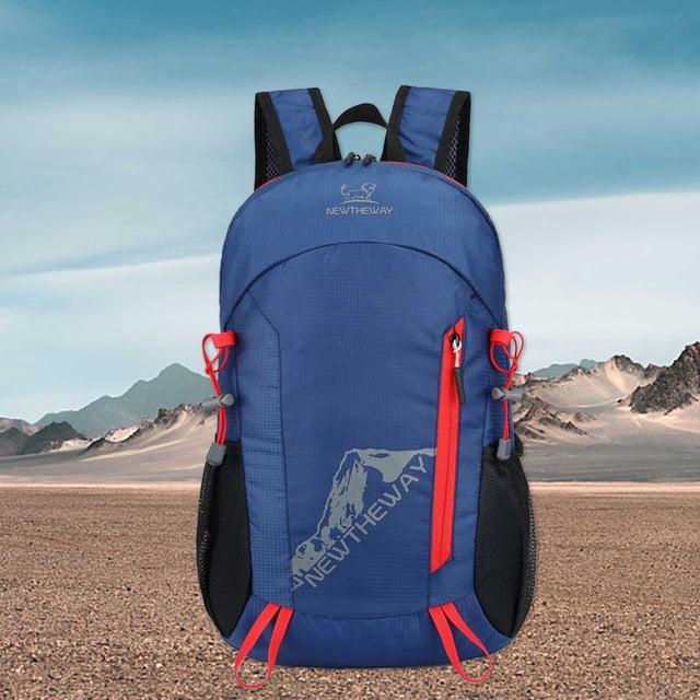 TopLLC Lightweight Foldable Packable Travel Small Hiking Backpack Daypack for men and women in dark blue polyester material. Features breathable mesh shoulder straps, side webbing for trekking poles, and a compact design measuring 28x19x45cm. Ideal for outdoor activities such as hiking, cycling, and mountaineering. Lightweight travel backpack displayed against a desert mountain landscape.