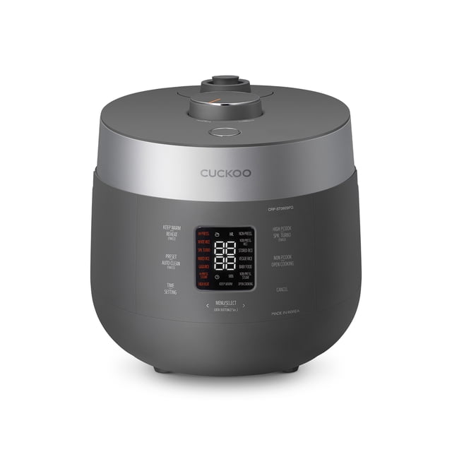 CUCKOO CRP-ST0609FG 6-Cup (Uncooked) / 12-Cup (Cooked) Twin Pressure Rice Cooker & Warmer in gray with a nonstick inner pot. Features a digital control panel with 16 menu options, including GABA/brown rice, white rice, and steaming functions. Includes dual pressure settings for high-pressure or non-pressure cooking, a keep-warm function, and an auto-clean feature. Compact design suitable for small to medium-sized families.