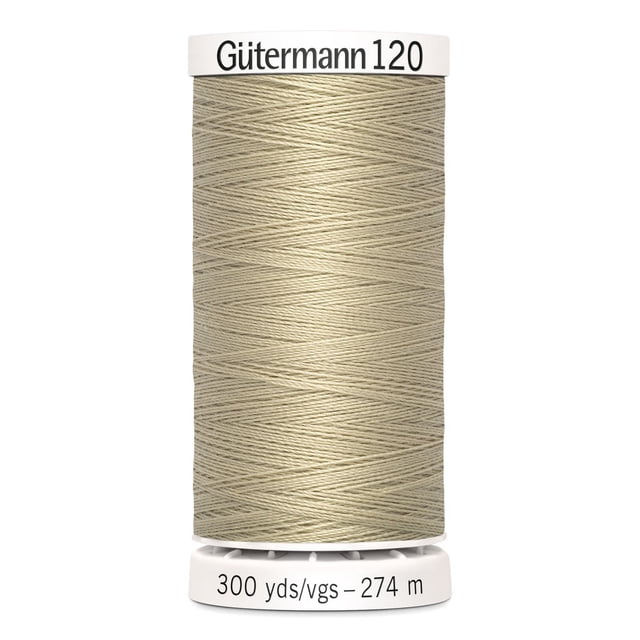 Gutermann 120 100% polyester all purpose sewing thread spool in beige, tightly wound on a white plastic spool labeled 300 yards (274 meters), suitable for machine and hand sewing various fabrics including cotton, synthetics, and natural fibers, also ideal for craft and mending projects.