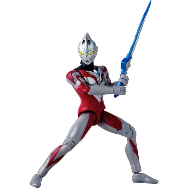 Ultraman Arc - Figurine Ultraman Arc Ultra Action Figure de 6 Pouces par Bandai Hobby, Posée Dynamiquement avec une Épée d'Énergie Bleue. la Figurine Présente des Détails d'Armure Rouges et Argentés, des Articulations pour un Mouvement Polyvalent, et un design Épuré Inspiré de l'Univers Ultraman. Parfaite pour Combattre des Monstres Kaiju Ou comme Figurine d'Action de Collection pour les fans de Personnages de Télé et de Film.