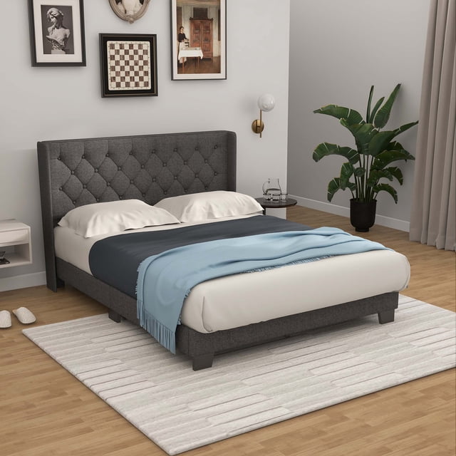 Costway Full Size Upholstered Platform Bed with tufted grey headboard, solid wooden slats, and polyester fabric upholstery. Designed for noise-free use without a box spring, it features under-bed storage space and adjustable foot pads for stability. Ideal for modern bedrooms or guest rooms.