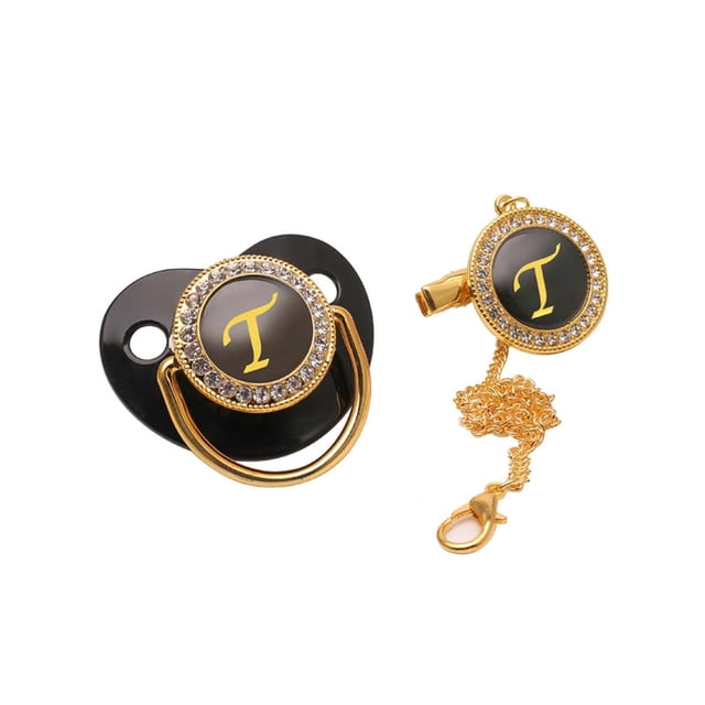 DPTALR Baby Pacifier 26 Letter Name Initial Clip Silicone Infant Nipple Bling Newborn Pacifier with a black silicone nipple adorned with a gold and rhinestone-encrusted circular design featuring the letter 'T'. Includes a matching gold clip and chain for secure attachment, ideal for special occasions like christenings or birthdays.