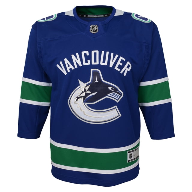 Infant Vancouver Canucks NHL Premier Home Team Jersey by Outerstuff, featuring a blue mesh design with green and white accents. The jersey displays the Vancouver Canucks team logo in screen print on the chest and measures approximately 16 to 17 inches from shoulder to hem with 10-inch sleeves. Made from 100% polyester and officially licensed by the NHL.