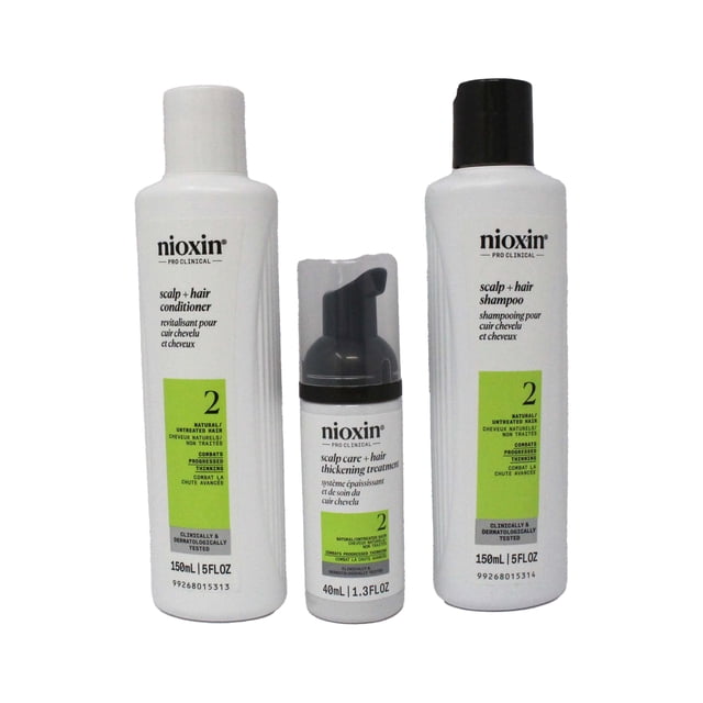 Nioxin Pro Clinical System 2 Haircare Set for natural, untreated hair, featuring three products: a 150mL scalp and hair shampoo, a 150mL scalp and hair conditioner, and a 40mL scalp care and hair thickening treatment. Designed to cleanse, optimize, and treat thinning hair, this set promotes a healthy scalp environment and fuller-looking hair. The bottles are white with green and black accents, and the set is clinically and dermatologically tested.
