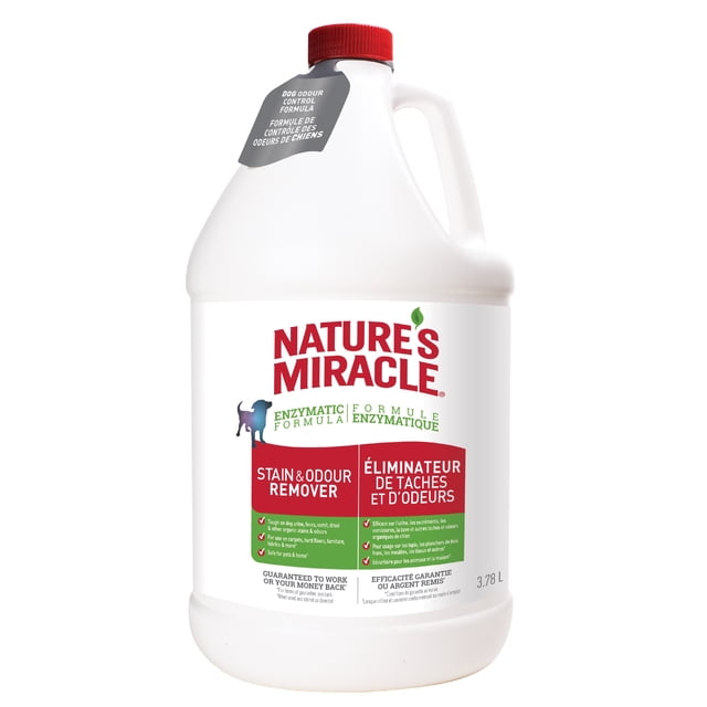Nature’s Miracle Stain And Odour Remover For Dogs 128 Ounces, 1 Gallon, white plastic jug with red cap and handle, enzymatic formula for removing dog urine, feces, vomit, and drool stains and odours on carpets, hard floors, furniture, and fabrics, featuring dog odour control formula and bilingual English-French label, safe for use around pets and home.