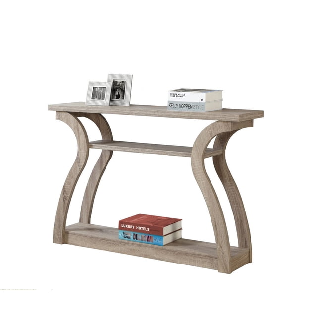 Monarch Specialties Accent Table console in brown laminate with a unique curved base and three-tiered open shelves, suitable for living room or entryway, shown with books and photo frames for decorative display.