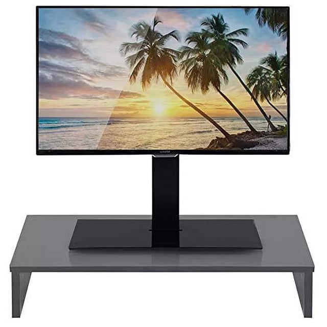 Duramex (TM) Riser Support de Moniteur d'Ordinateur, un Support de Moniteur de 16 Pouces de large Conçu pour Économiser de l'Espace et Améliorer l'Organisation du Bureau. le Riser Présente un design simple et Mince, Convient à Tout Décor, et Mesure Environ 16 x 8 x 3 Pouces. Il a une Grande Capacité de Charge de 22 Lb et Nécessite un Assemblage. Montré Ici, Prenant en Charge un Moniteur avec une image de Plage Tropicale sur l'Écran.