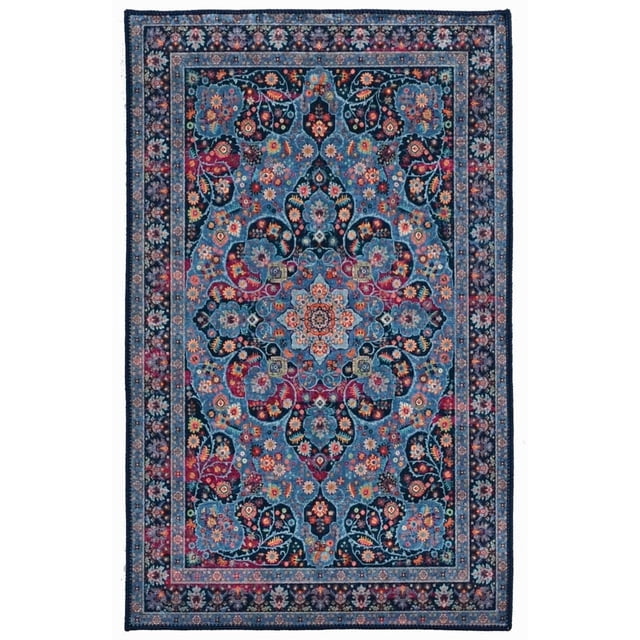 Emerald Farlin Black & Ivory 2'2" x 3'2" accent rug with low pile polyester construction, featuring a detailed traditional floral pattern in cool blue and ivory tones, sharp heat transfer design, serged edges, and a felt backing with rubber grips, suitable for doorways and kitchen areas.