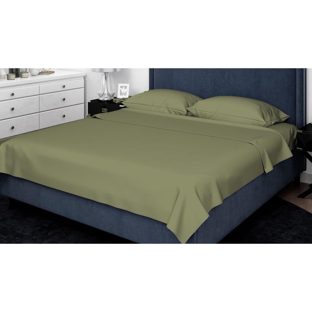 Johnson Home 600 Thread Count Organic Cotton Sheet Set in olive green on a navy blue upholstered bed with nailhead trim headboard, set in a modern bedroom with white dresser and black nightstand, featuring soft, breathable organic cotton fabric and two matching pillowcases, ideal for year-round comfort.
